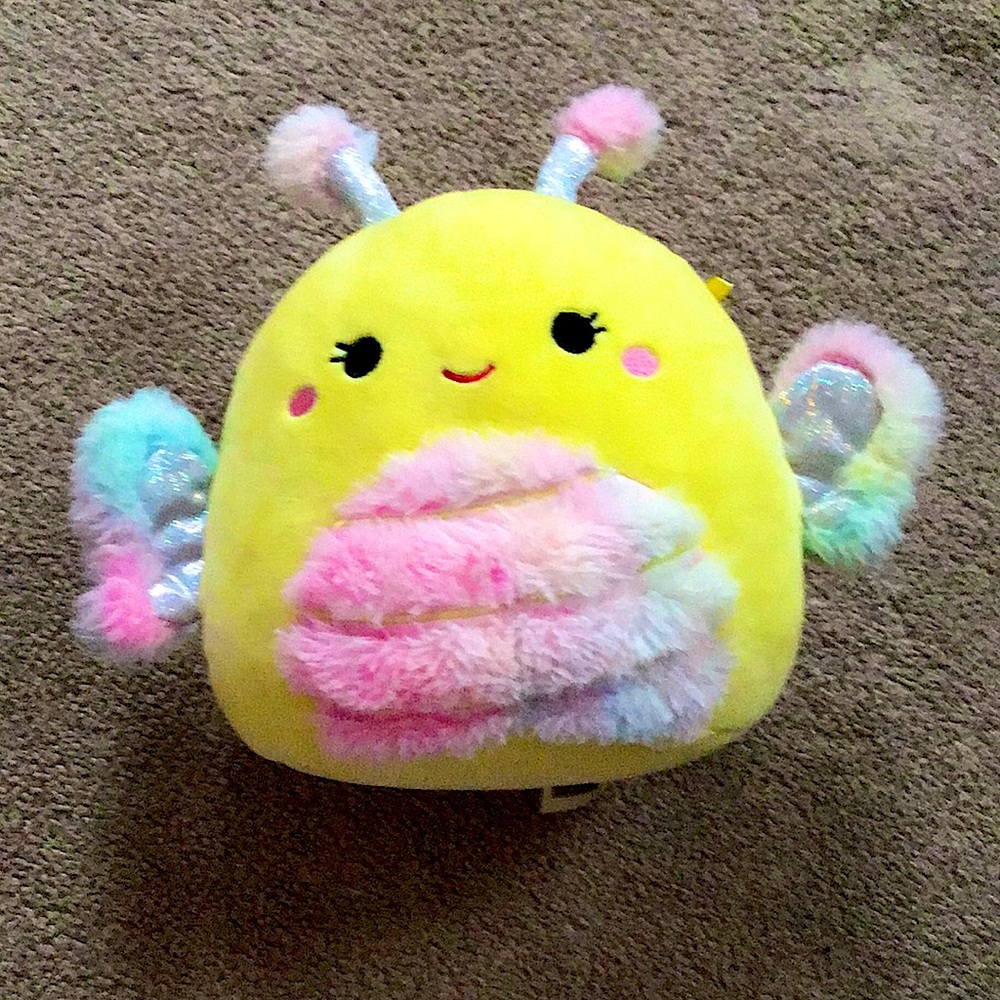 This fluffy yellow toy is called a squish mellow.